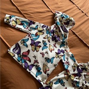 Little girls butterfly, matching top and bottoms outfit.